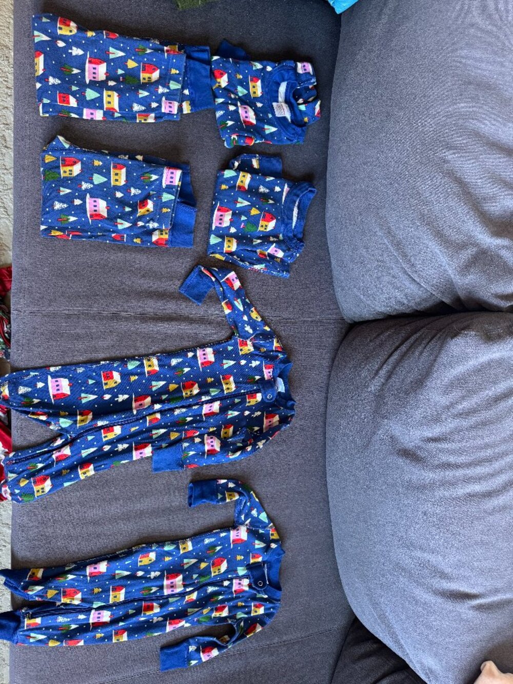 Four pairs of matching family sibling holiday christmas Hanna Andersson pajamas